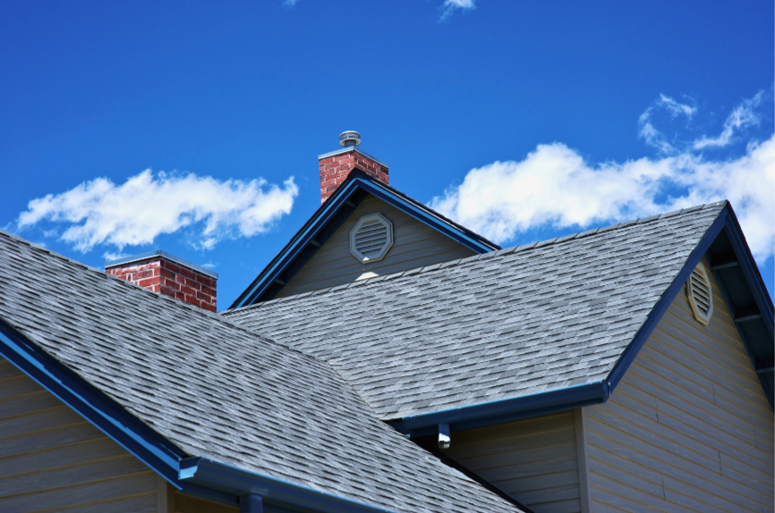 Rows of 2000s-era rooftops in a Frisco, TX subdivision
